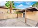 Covered carport parking with storage area at 6133 Meadowgrass Ln, Las Vegas, NV 89103