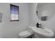 Clean and updated bathroom with white vanity and fixtures at 6285 Crusted Dome Ct, Las Vegas, NV 89139