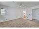 Bright and airy bedroom with ceiling fan and en-suite bathroom at 6285 Crusted Dome Ct, Las Vegas, NV 89139