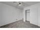 Spacious bedroom with ceiling fan and mirrored closet doors at 6285 Crusted Dome Ct, Las Vegas, NV 89139