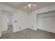 Spacious bedroom with ceiling fan and carpet flooring at 6285 Crusted Dome Ct, Las Vegas, NV 89139