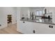 Modern kitchen with gray countertops and stainless steel appliances at 6285 Crusted Dome Ct, Las Vegas, NV 89139