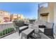 Cozy patio with wicker furniture and a view of the neighborhood at 6285 Crusted Dome Ct, Las Vegas, NV 89139