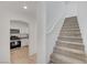 Stylish staircase with carpeted steps leading to the upper level at 6285 Crusted Dome Ct, Las Vegas, NV 89139