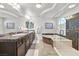 Large bathroom with double sinks and marble countertops at 6456 Grande River Ct, Las Vegas, NV 89139