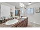 Well-appointed bathroom with double sinks and stylish decor at 6456 Grande River Ct, Las Vegas, NV 89139