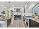 Spacious kitchen featuring stainless steel appliances and granite countertops at 6456 Grande River Ct, Las Vegas, NV 89139