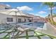 Resort-style backyard with a large pool and plenty of lounge space at 6456 Grande River Ct, Las Vegas, NV 89139