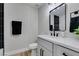 Stylish bathroom with updated vanity, quartz countertop, and modern fixtures at 647 Greenbriar Townhouse Way, Las Vegas, NV 89121