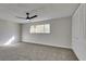 Bright bedroom with new carpet and large closet at 647 Greenbriar Townhouse Way, Las Vegas, NV 89121