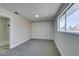 Well-lit bedroom with neutral carpeting and built-in closet at 647 Greenbriar Townhouse Way, Las Vegas, NV 89121