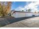 Attached garage with automatic door opener at 647 Greenbriar Townhouse Way, Las Vegas, NV 89121