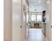 Bathroom hallway with light walls and a view of the Primary bathroom at 6640 Palmyra Ave, Las Vegas, NV 89146