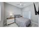 Bright bedroom with plush bedding and private access at 6640 Palmyra Ave, Las Vegas, NV 89146