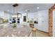 Large kitchen island with granite countertop, perfect for casual dining at 6640 Palmyra Ave, Las Vegas, NV 89146