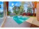 Sparkling pool with adjacent patio and seating at 6640 Palmyra Ave, Las Vegas, NV 89146