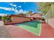 Private backyard sports court with basketball and pickleball at 6640 Palmyra Ave, Las Vegas, NV 89146