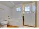 Bathroom featuring bathtub, glass-enclosed shower, and tile floors at 7233 Eaglegate St, Las Vegas, NV 89131