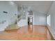 Bright and spacious living room featuring tile flooring, a staircase, and high ceilings at 7233 Eaglegate St, Las Vegas, NV 89131