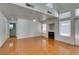 Living area with fireplace, bright natural lighting, tile floors and high ceilings at 7233 Eaglegate St, Las Vegas, NV 89131