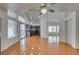 Bright living room featuring an open floor plan and easy access to the kitchen with stainless appliances at 7233 Eaglegate St, Las Vegas, NV 89131