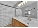 Double vanity bathroom with a view into bedroom at 7490 Thistle Poppy St, Las Vegas, NV 89139