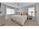 Main bedroom with king-size bed and neutral decor at 7490 Thistle Poppy St, Las Vegas, NV 89139