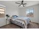 Spacious bedroom with large window and ceiling fan at 7638 Peaceful Trellis Dr, Las Vegas, NV 89179