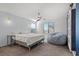 Bright bedroom with shiplap accent wall and window at 7638 Peaceful Trellis Dr, Las Vegas, NV 89179