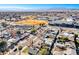 Wide aerial view showing the house, neighborhood, and surrounding landscape at 801 7Th St, Boulder City, NV 89005