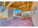 Covered patio with seating area and brick floor at 801 7Th St, Boulder City, NV 89005