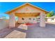 Covered patio with seating area and brick floor at 801 7Th St, Boulder City, NV 89005