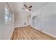 Light and airy bedroom with wood-look floors and a ceiling fan at 801 7Th St, Boulder City, NV 89005