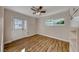 Bright bedroom with wood-look floors and exterior access at 801 7Th St, Boulder City, NV 89005