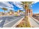 Townhome community entrance with palm trees and archway at 801 7Th St, Boulder City, NV 89005