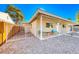 Inviting front porch with seating area and view of the nicely landscaped yard at 801 7Th St, Boulder City, NV 89005