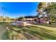 Park gazebo with brick base and grassy area at 801 7Th St, Boulder City, NV 89005