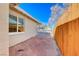 Side yard with gate access and gravel at 801 7Th St, Boulder City, NV 89005