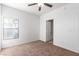 Bedroom with bathroom access and ceiling fan at 8250 N Grand Canyon Dr # 2073, Las Vegas, NV 89166