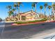 Grand Canyon Condominium Homes entrance with palm trees at 8250 N Grand Canyon Dr # 2073, Las Vegas, NV 89166