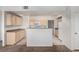 Kitchen with light cabinets and modern appliances at 8250 N Grand Canyon Dr # 2073, Las Vegas, NV 89166