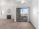 Living room with fireplace and sliding glass doors to balcony at 8250 N Grand Canyon Dr # 2073, Las Vegas, NV 89166