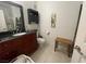 Clean bathroom with dark vanity and tiled floors at 833 Aspen Peak Loop # 1014, Henderson, NV 89011