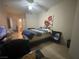 Comfortable bedroom with ample space and access to bathroom at 833 Aspen Peak Loop # 1014, Henderson, NV 89011