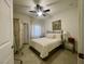 Cozy bedroom with neutral tones, complete with a ceiling fan and ample natural light at 833 Aspen Peak Loop # 1014, Henderson, NV 89011