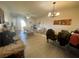 Spacious living room with beige tile floors and ample natural light at 833 Aspen Peak Loop # 1014, Henderson, NV 89011