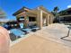 Poolside cabana with lounge chairs and tables at 833 Aspen Peak Loop # 1014, Henderson, NV 89011