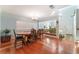 Formal dining room with hardwood floors and a chandelier at 8600 Copper Falls Ave, Las Vegas, NV 89129