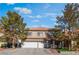 Two-story house with a three-car garage and landscaping at 8600 Copper Falls Ave, Las Vegas, NV 89129