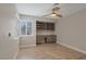 Bright bedroom with built-in shelves and hardwood floors at 8608 Millsboro Dr, Las Vegas, NV 89134